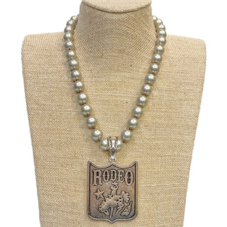 Rodeo Pendant on Faux Navajo Pearl Necklace