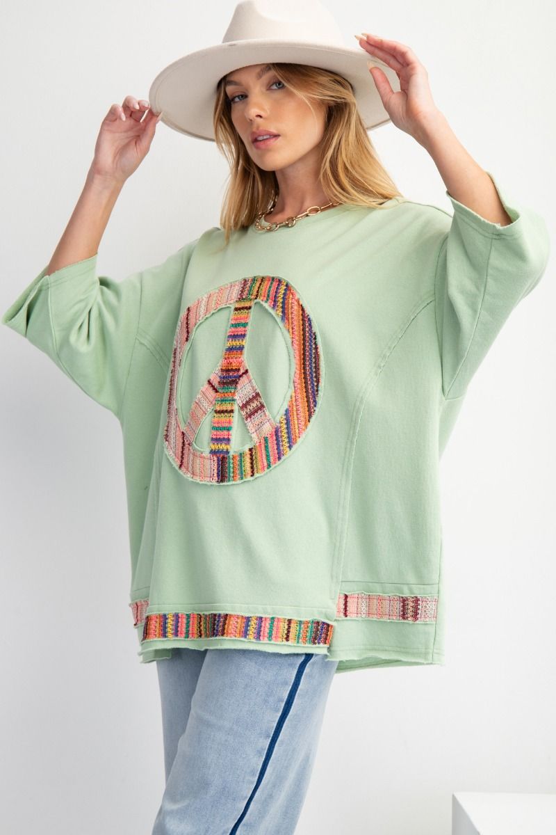 FRONT PEACE PATCH KNIT TOP